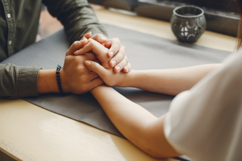 a couple holding hands