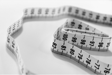 a measuring tape signifying weight gain