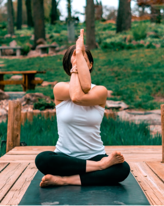 A woman doing yoga in fresh air