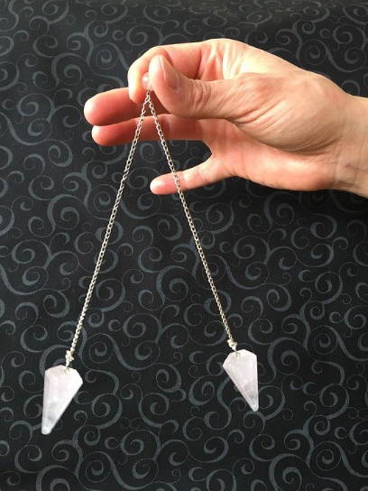 hypnotist swinging pendulum