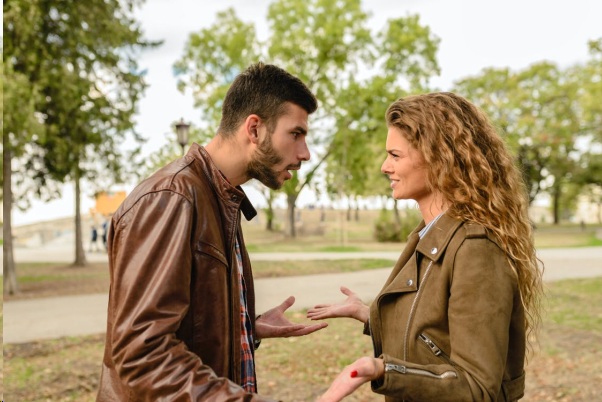 A Heterosexual Couple Facing Each Other in the Middle of a Verbal Altercation