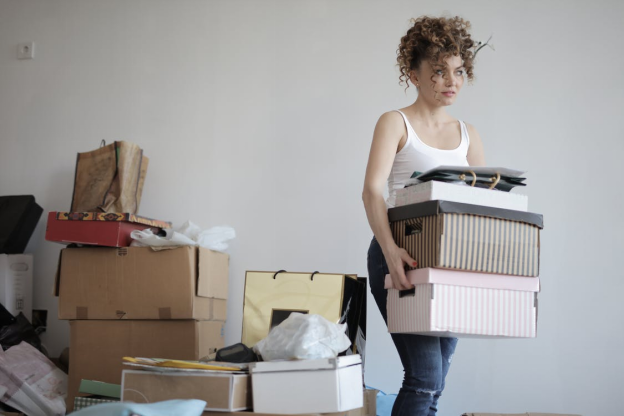 a young woman hoarding items