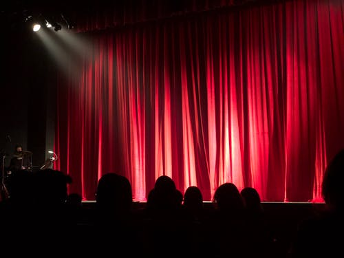 Stage with red curtains